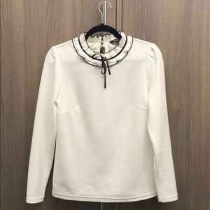 White blouse with bow